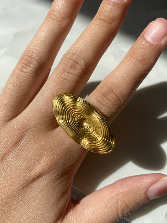 Anillo spiral dorado ajustable