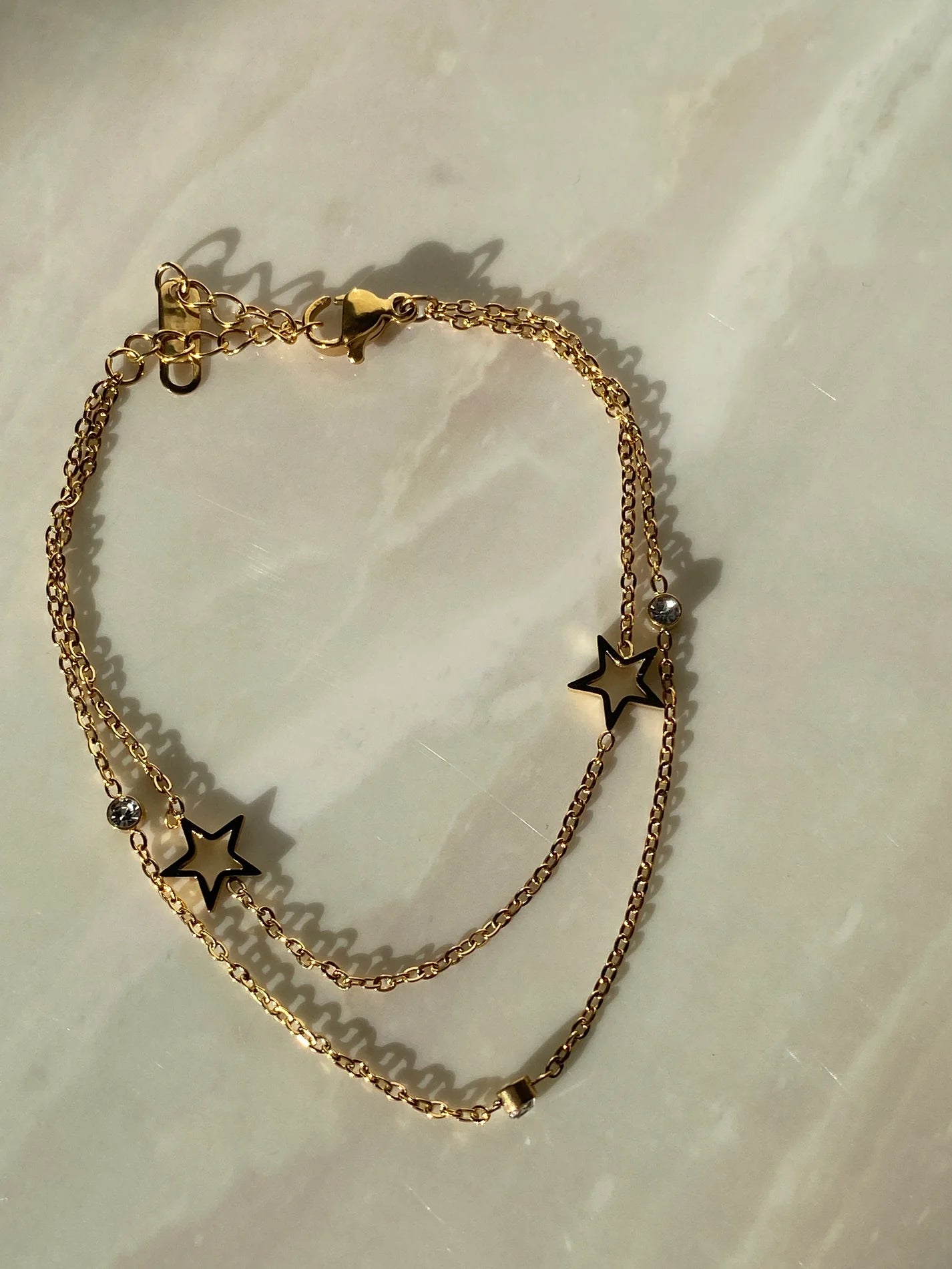 Pulsera de estrellas dorada